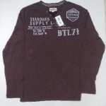 a long sleeved coffe colour shirt with a BTL71 tag on it