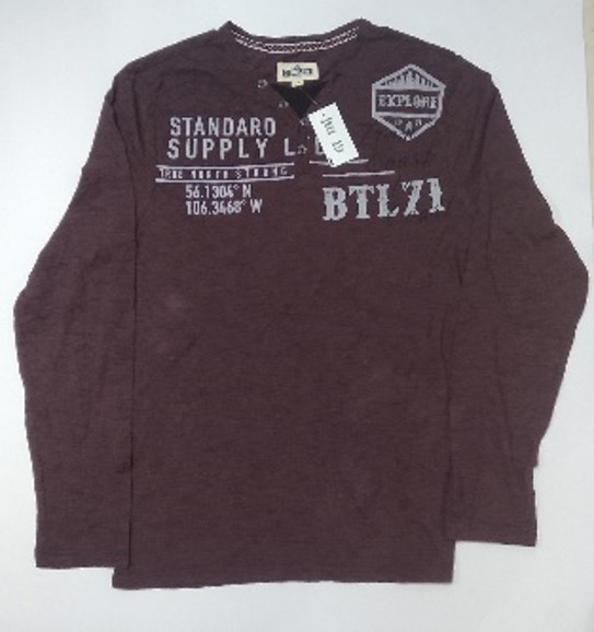 a long sleeved coffe colour shirt with a BTL71 tag on it